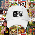 The Casquette "OG frame" de Weird Birds by WEIRD BIRDSS, featuring bold black text, is displayed in front of a vibrant collage of retro horror and pulp magazine covers with striking artwork and dramatic lettering.